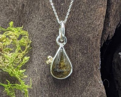 Silver pearshaped yellow tourmaline pendant with gold granulation