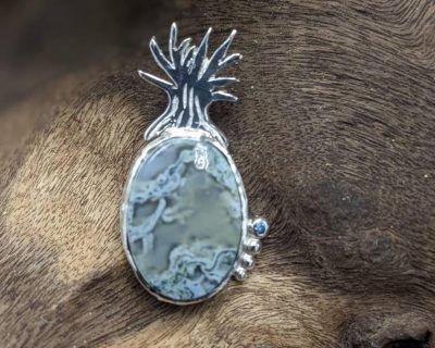 Moss agate tree themed pendant with blue diamond