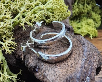 Chunky handmade silver hoop earrings with Hammer finish.