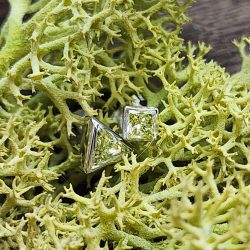 9ct white mismatched yellow diamond earrings, one triangle and one princess cut, 32 points