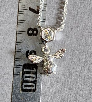 Silver Bee and Honeycomb pendant.